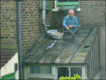 how to clean a roof